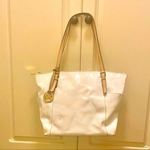 Michael Kors purse, white with gold accents.